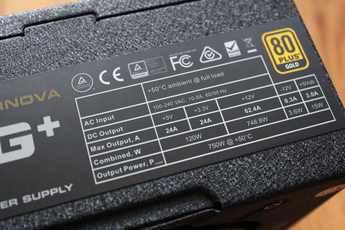 EVGA 750 G+ Power supply specs table on PSU up close