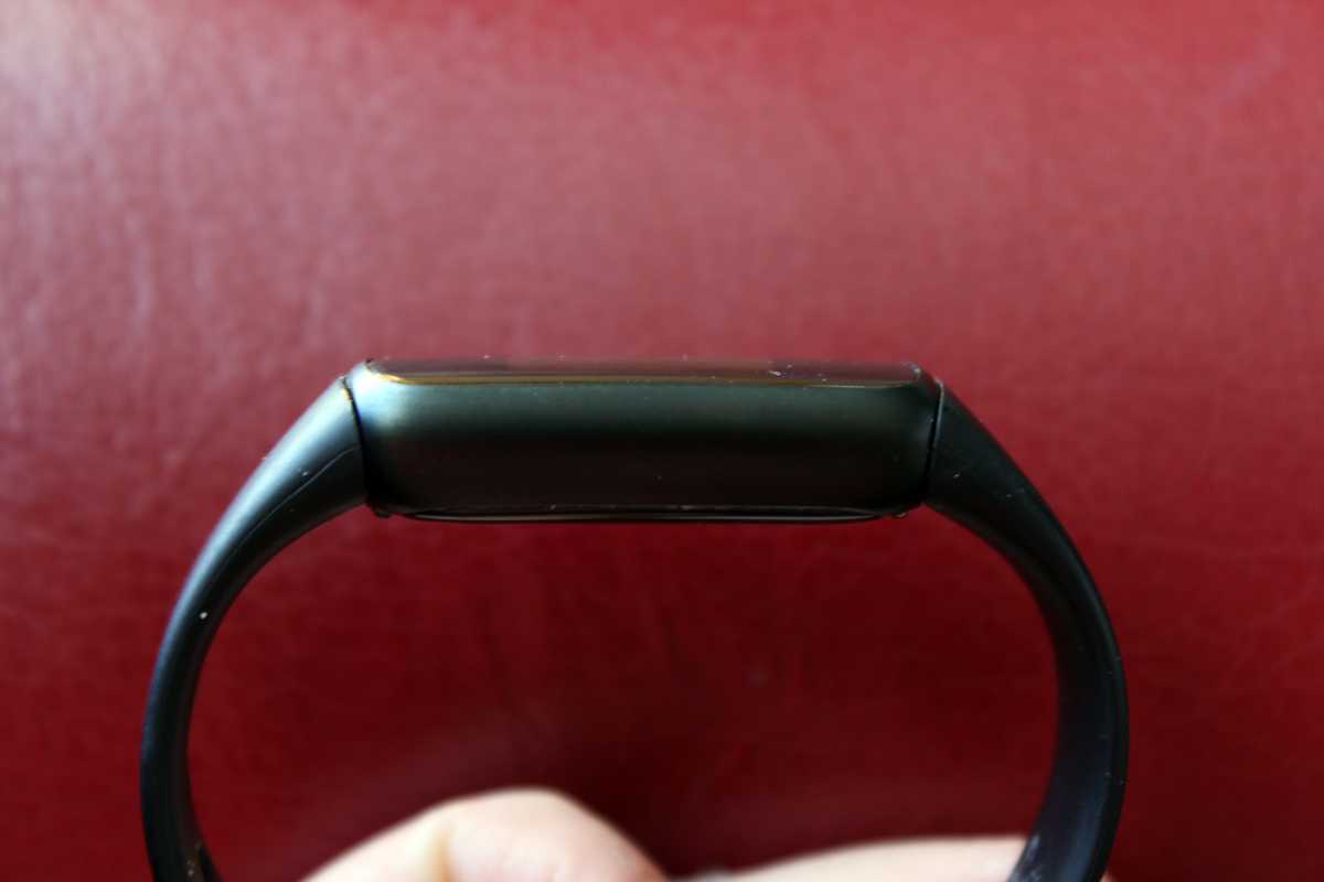 Fitbit Luxe from side view to show how thick it is