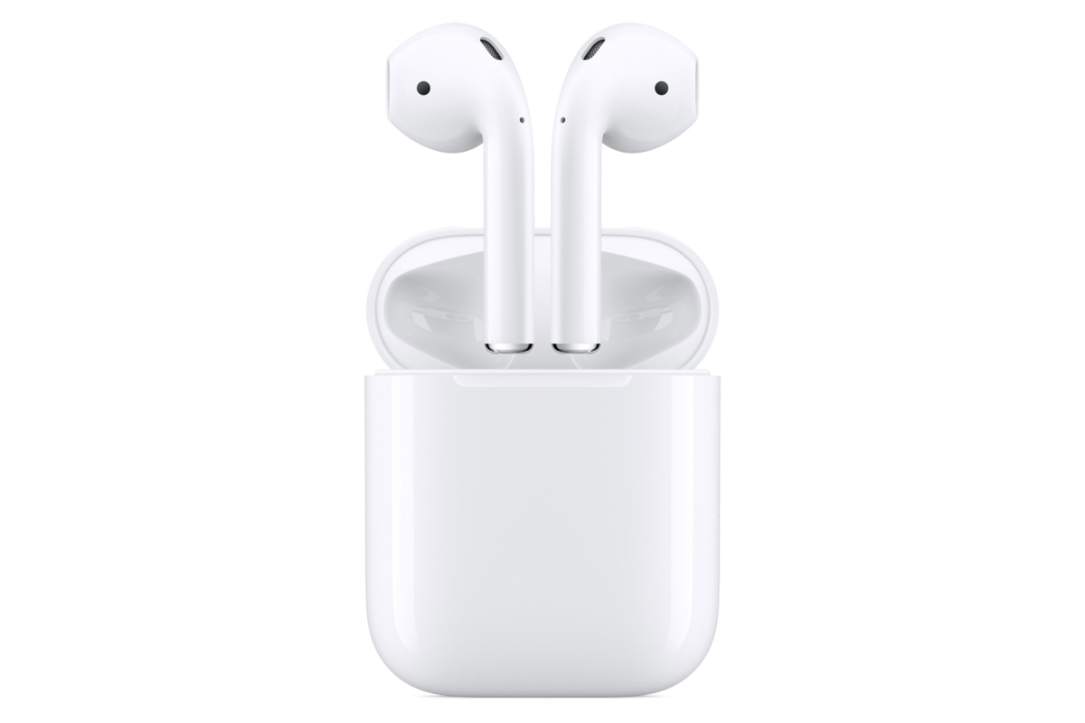 Apple AirPods hovering over an open charging case