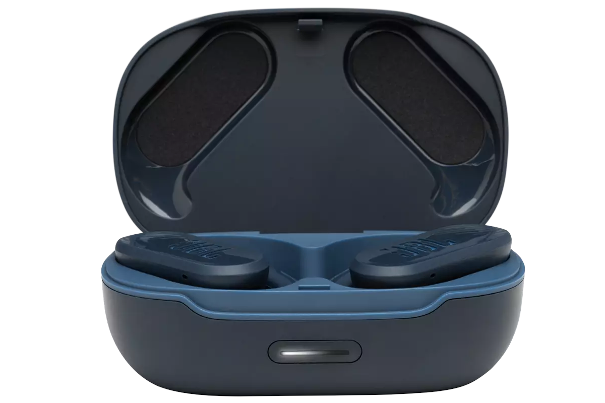 JBL wireless earbuds resting in their charging case.