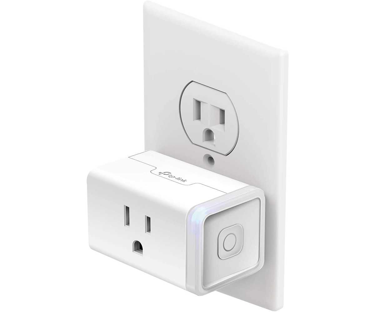 TP-Link Kasa Smart Mini Plug plugged into a white power outlet