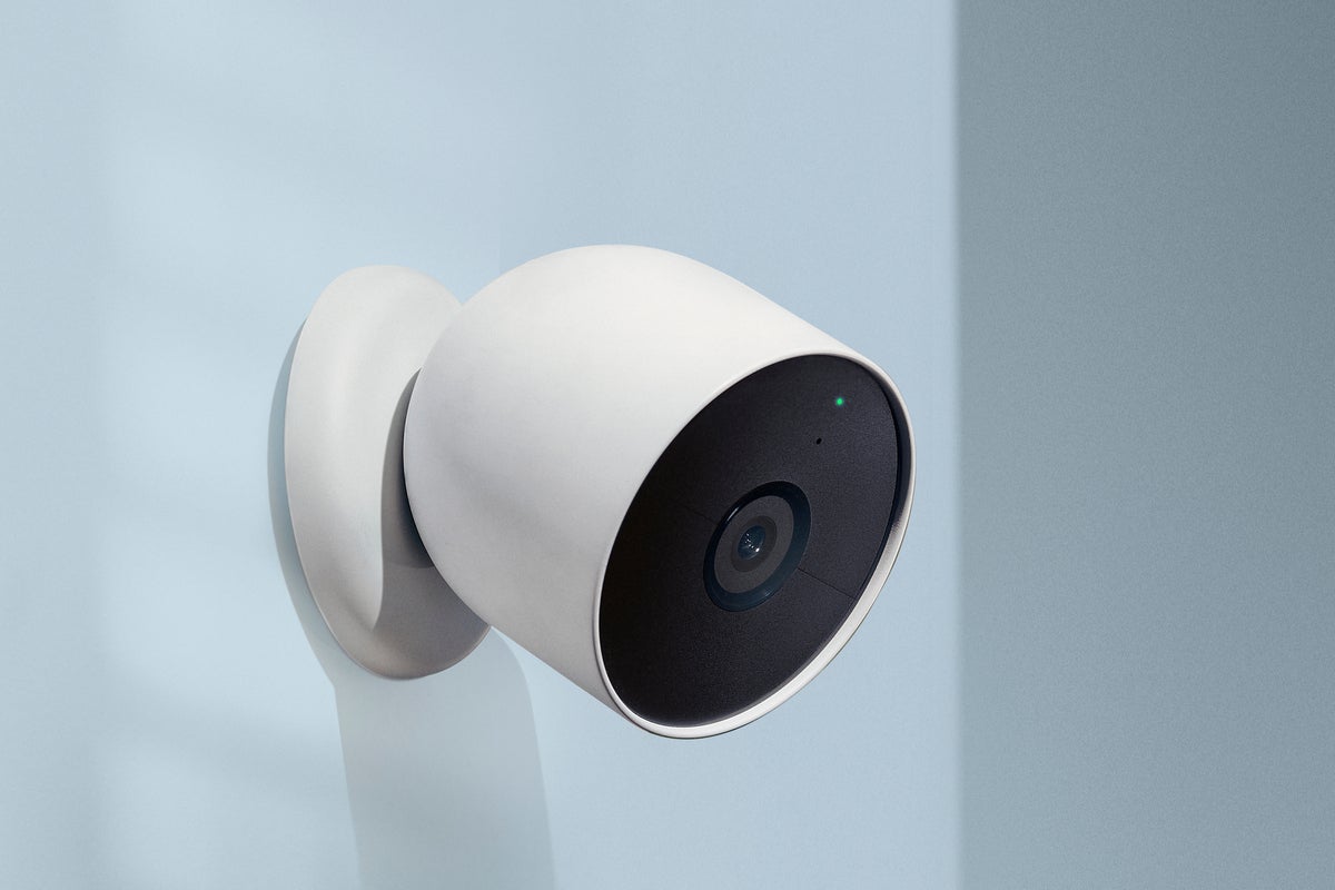 nest cam mounted on a light blue wall