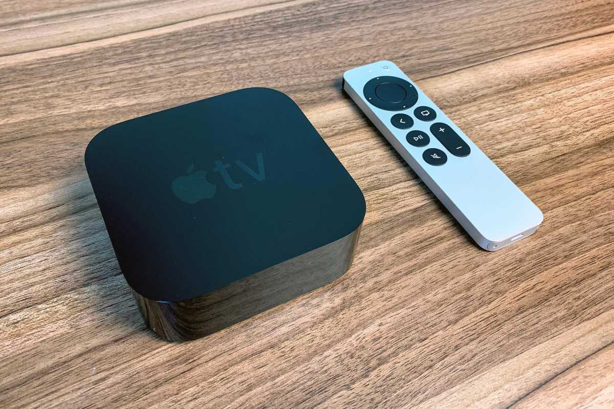 Apple TV 4K on a wood table