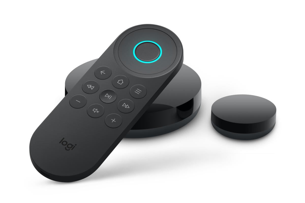 A Logitech Harmony Express remote testing on a black puck-like receiver