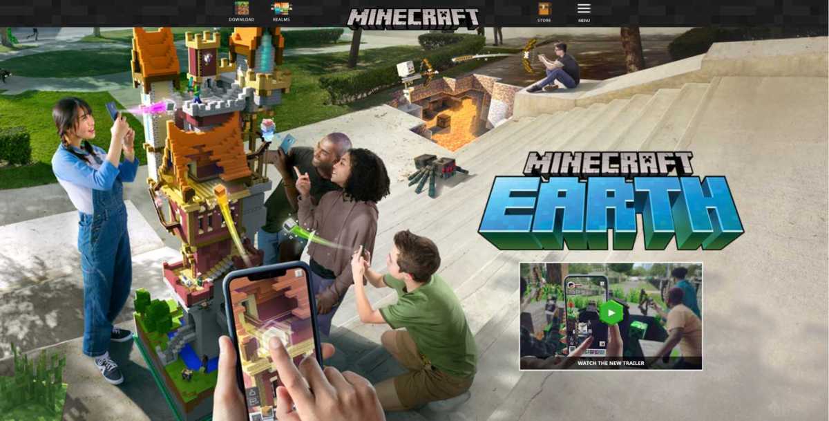 Four people gathered around a virtual Minecraft creation