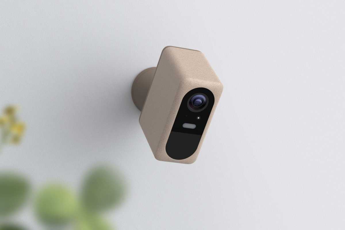 Nooie Cam Pro mounted to a wall, pointing down