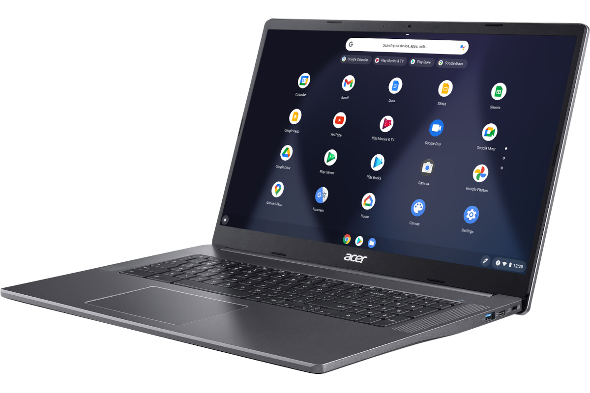 A gray Acer chromebook facing from right with the Chrome OS apps screen on the display.