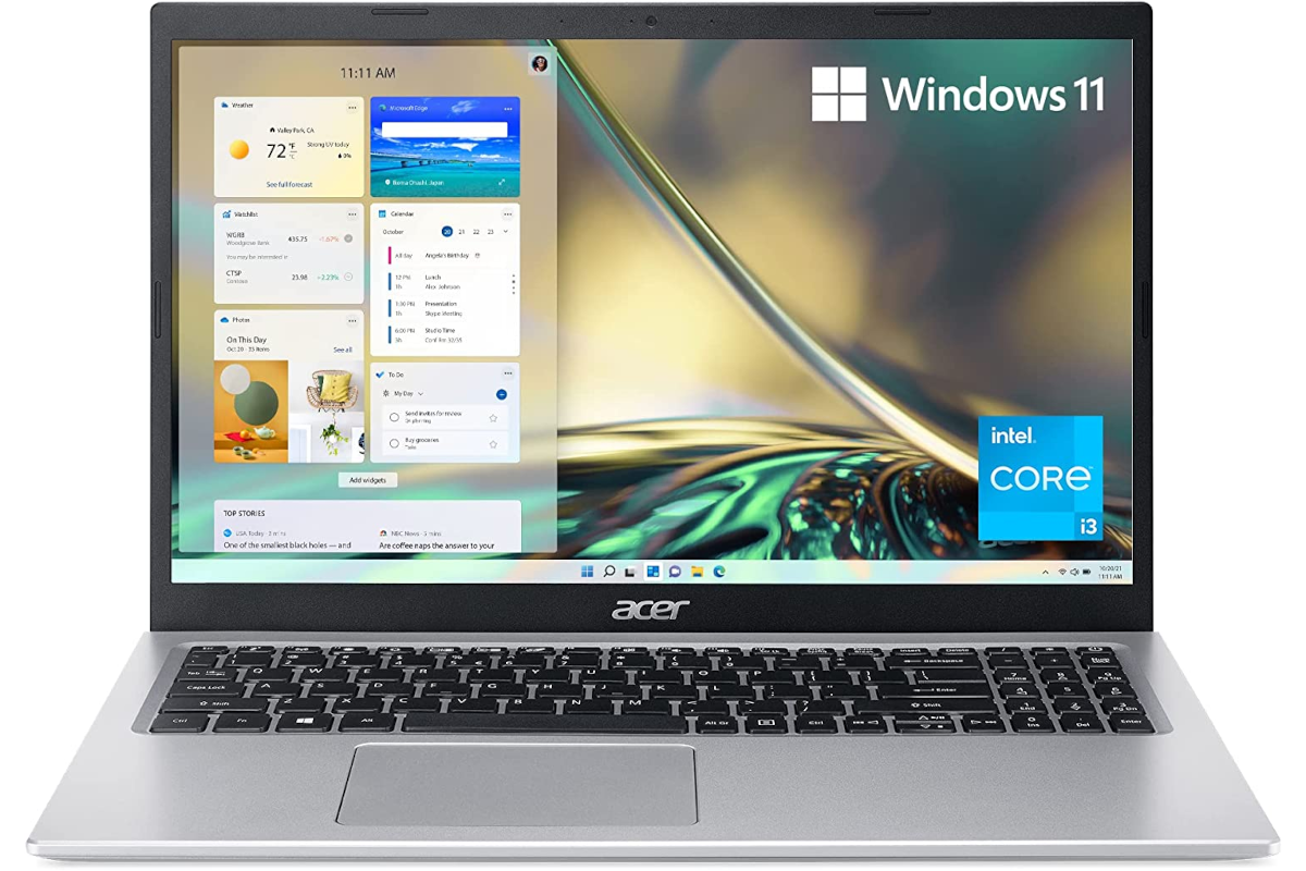 A silver laptop facing front running Windows 11