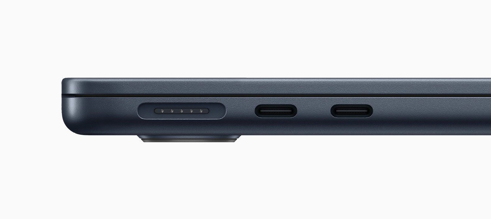MacBook Air from the side showing Magsafe and two Thunderbolt ports
