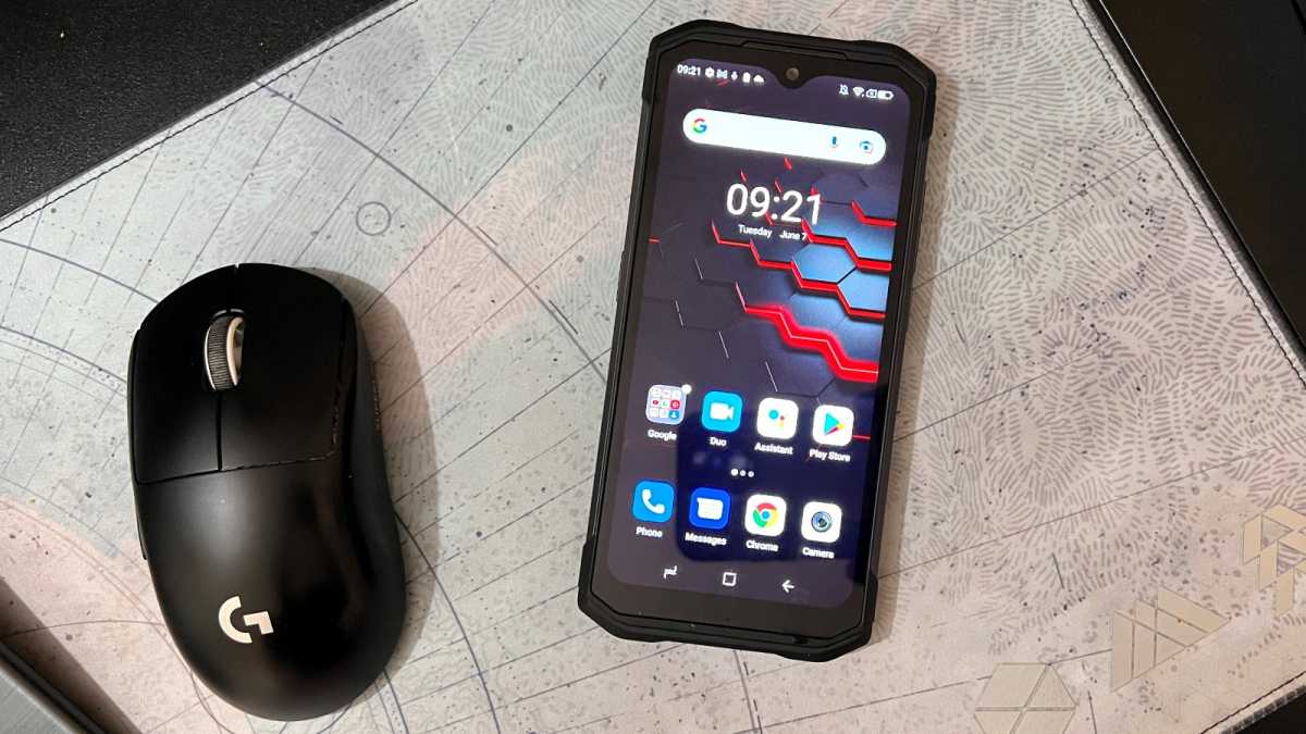 Doogee S98 Pro next to a wireless mouse