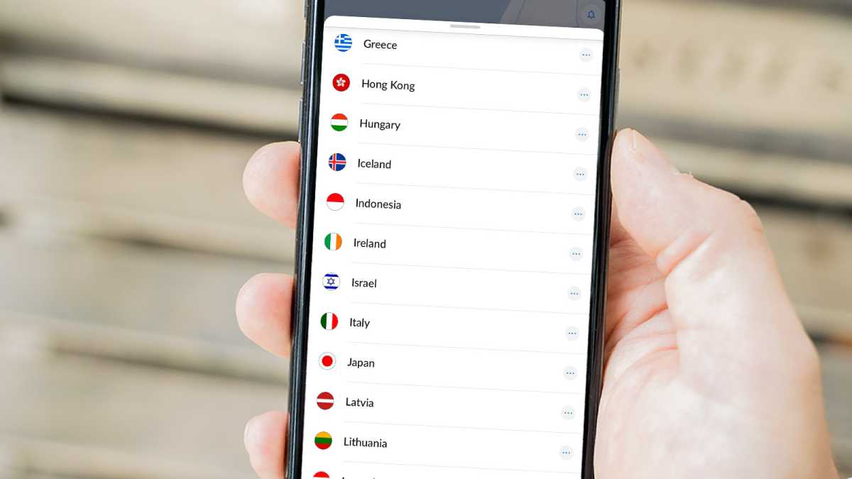 Phone with NordVPN app showing country list