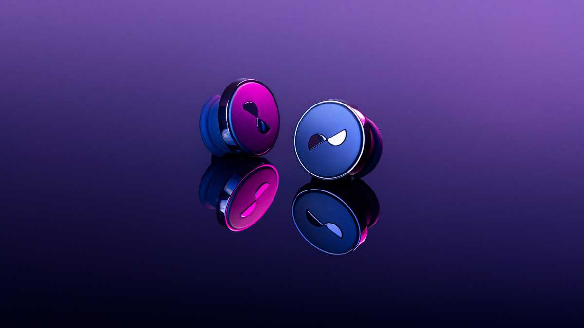 NuraTrue Pro buds on a purple and black background