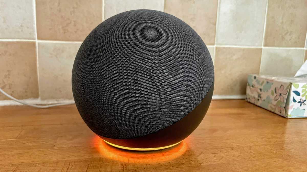 Amazon Echo 4 with orange LED ring on kitchen counter