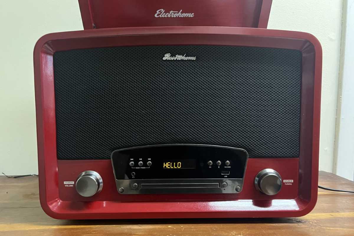 Kingston 7-in-1 record player with hello on its display