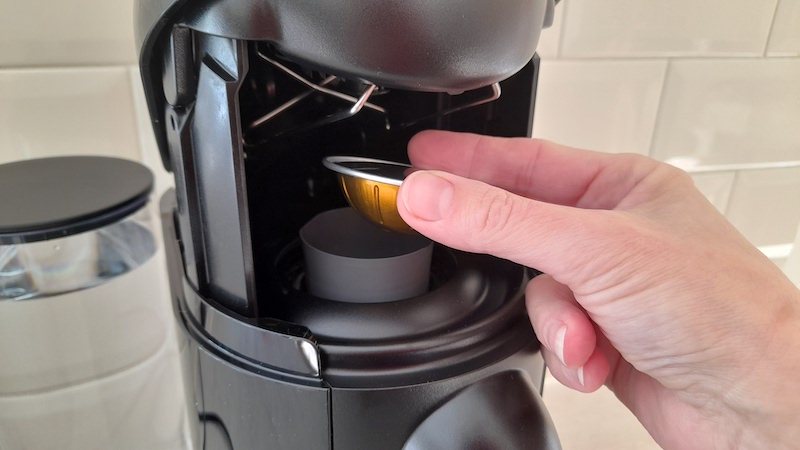 Nespresso Vertuo Plus review - latest science and technology news 2021 - Technology - Public News Time Inserting a pod into a Vertuo machine