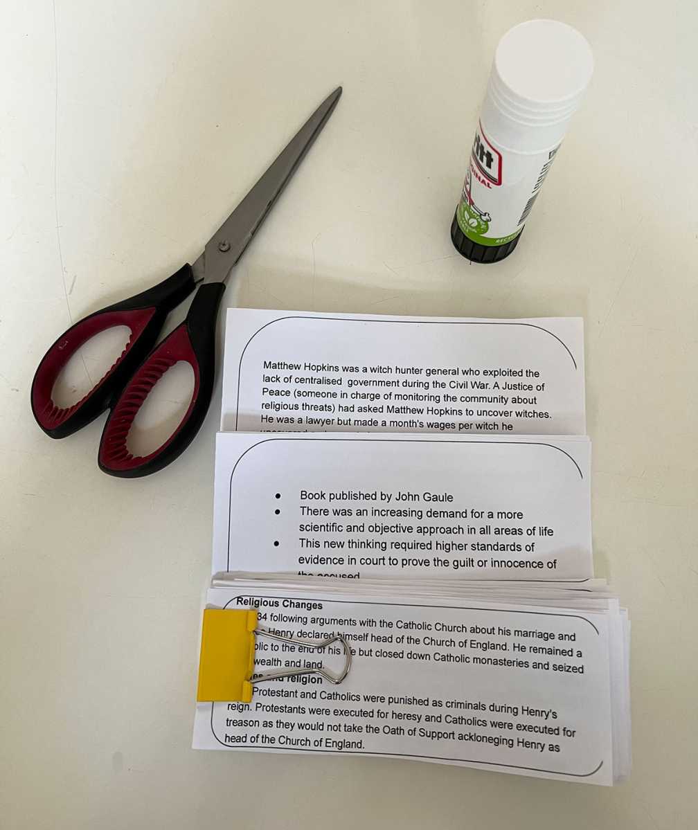 Creating flashcards with scissors and glue stick