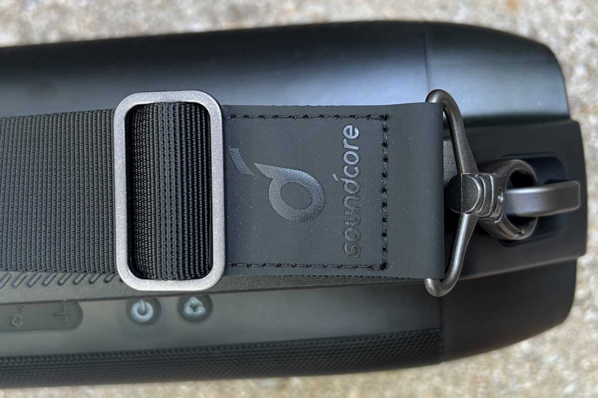 The Soundcore Motion Boom Plus speaker features a strap with sturdy hardware. 