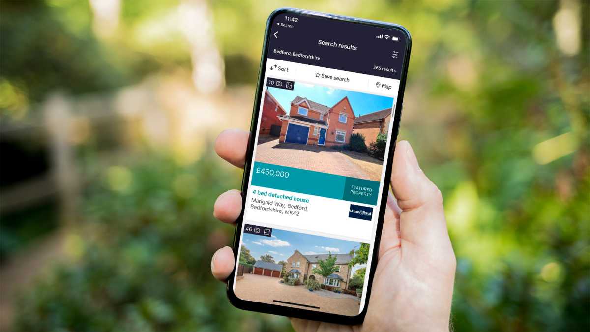 Phone showing Rightmove search results