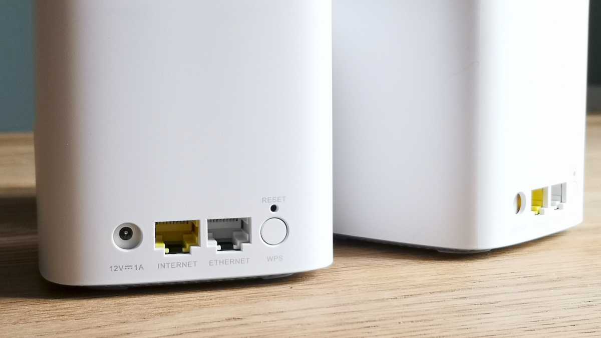 The Ethernet ports of two D-Link M15 mesh Wi-Fi units