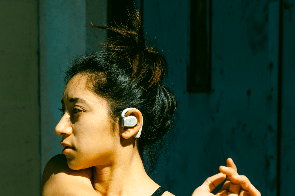 Model wearing Cleer Arc