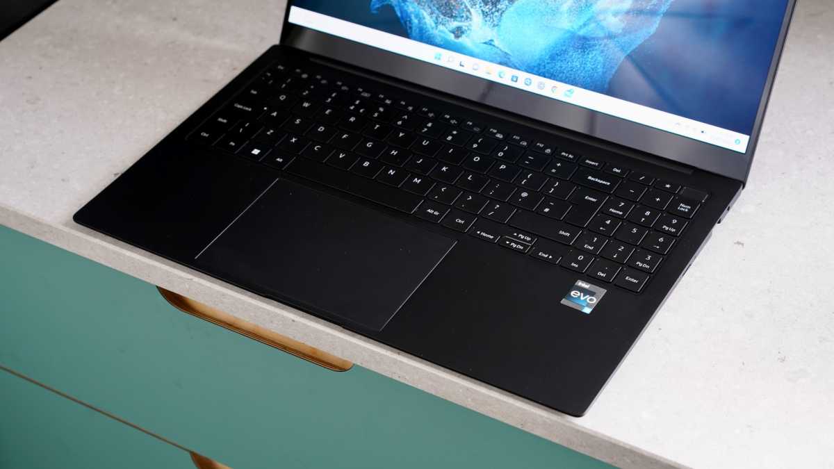 Samsung Galaxy Book 2 Pro above green drawers