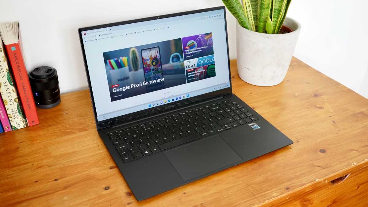 Samsung Galaxy Book 2 Pro on desk with plant