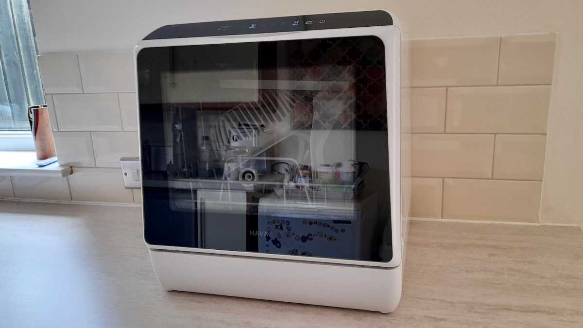 A fully loaded Hava dishwasher with its door closed