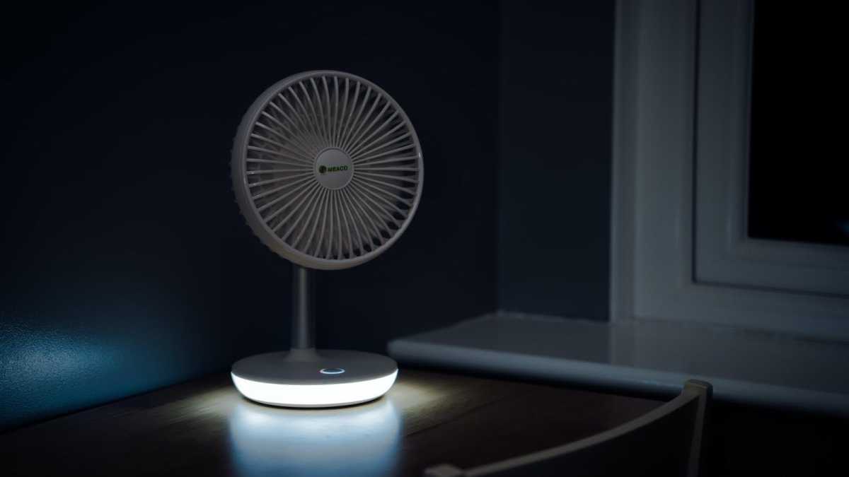 Meaco desk fan in a dark room, showing its nightlight function