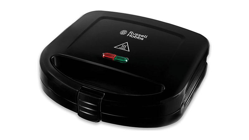 Black sandwich toaster on a white background