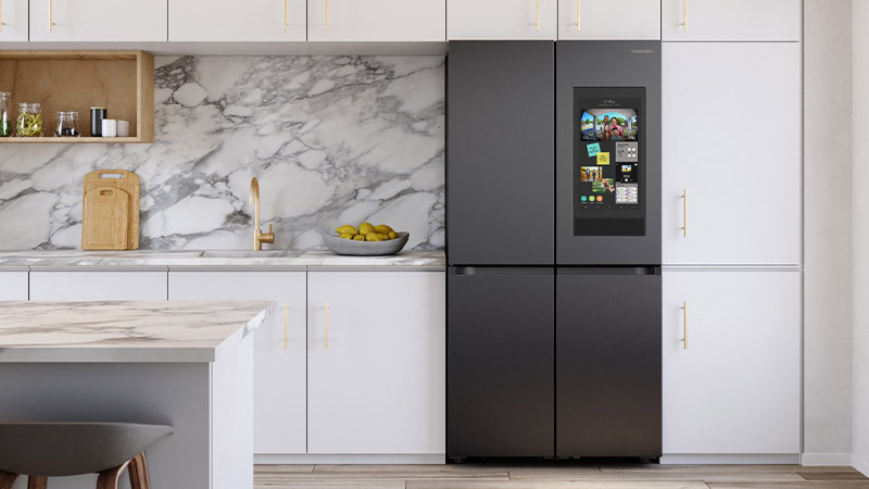 A Samsung fridge with Family Hub screen in a kitchen