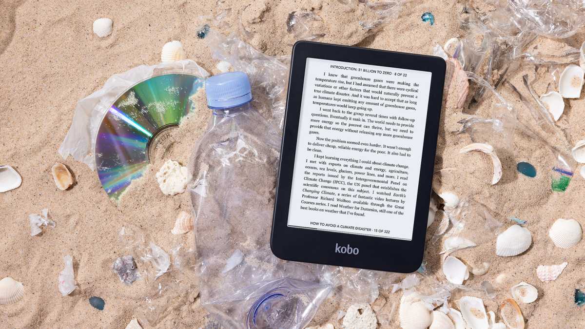 A Kobo Clara 2E with water bottle and ocean waste