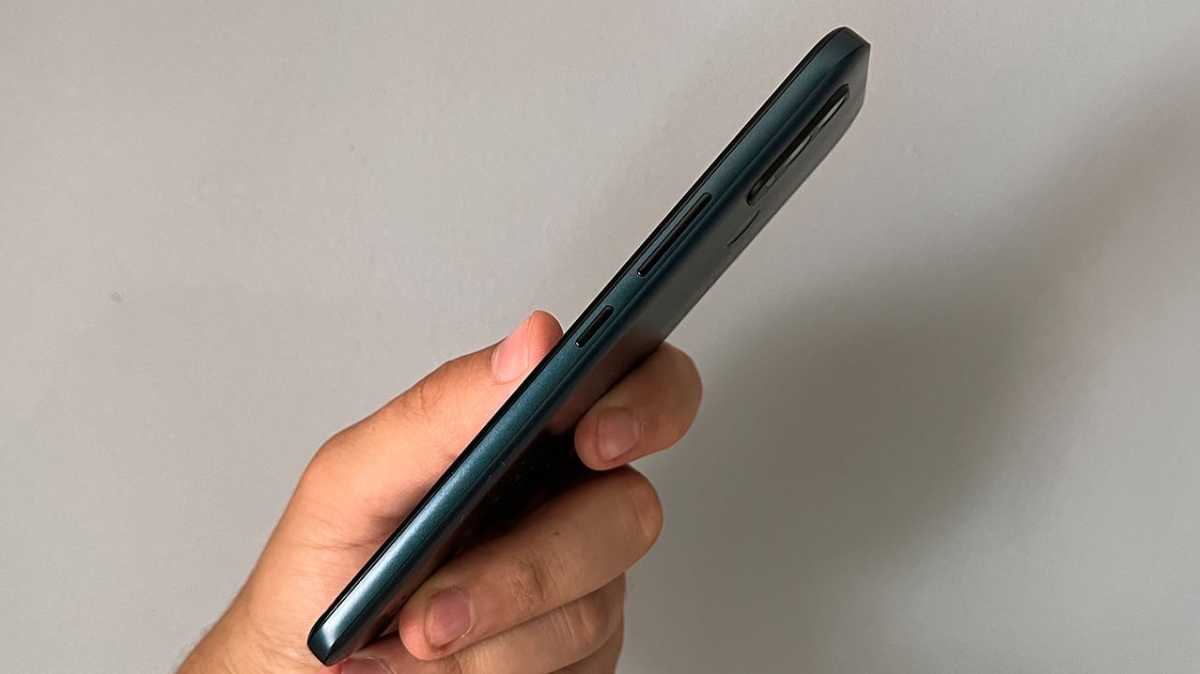 Nokia C21 Plus on the side in the hand