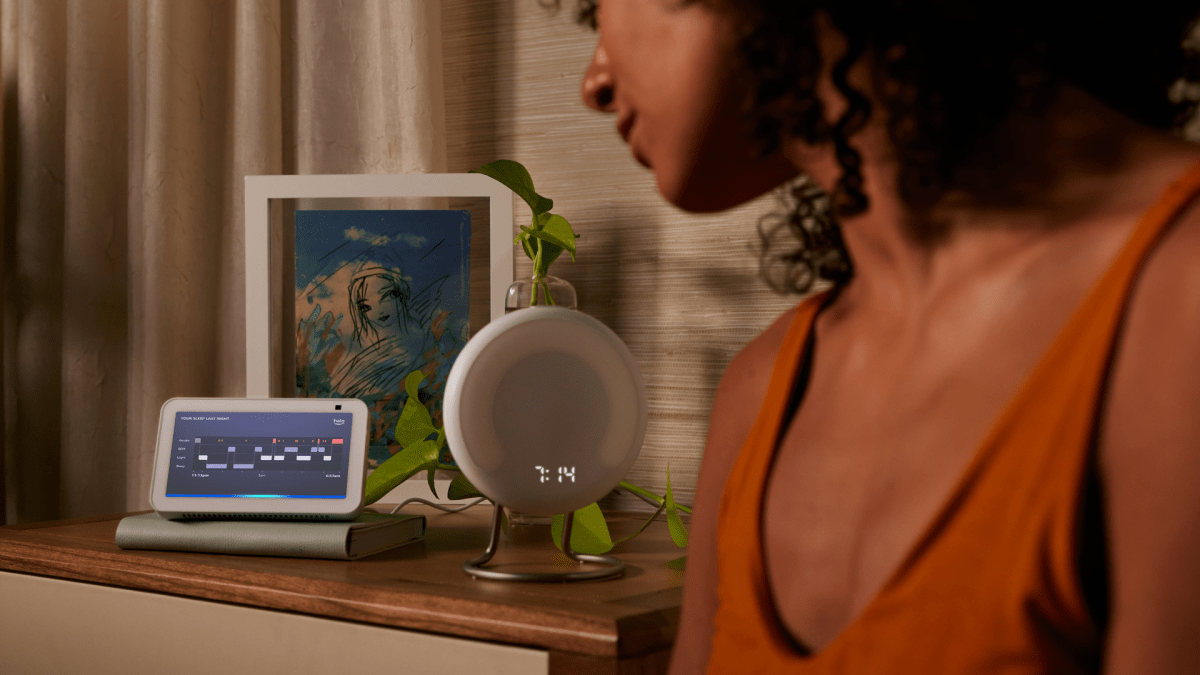 Amazon Halo Rise next to Echo Show showing sleep data