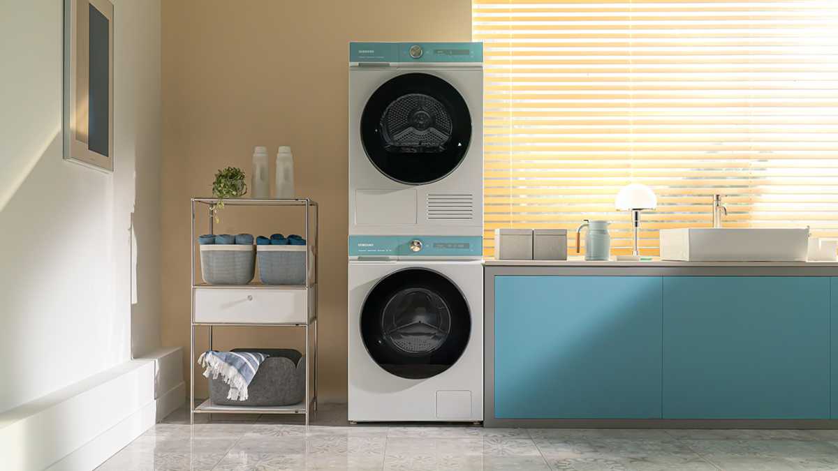 Samsung washer dryer in a blue and white utility room