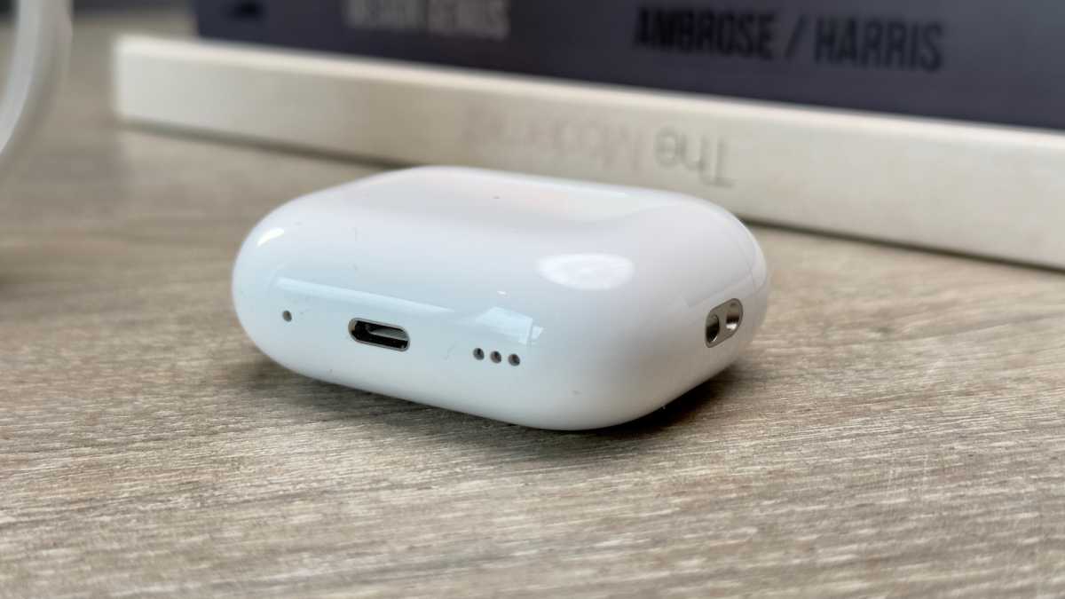 Side view of AirPods Pro (2022) showing lanyard connection and new speaker