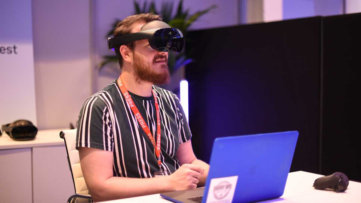 Wearing Meta Quest Pro at a desk