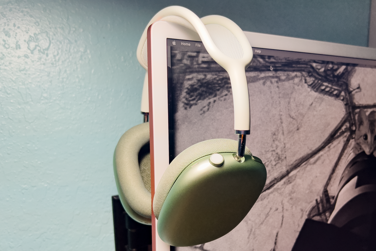 AirPods Max hanging from a monitor