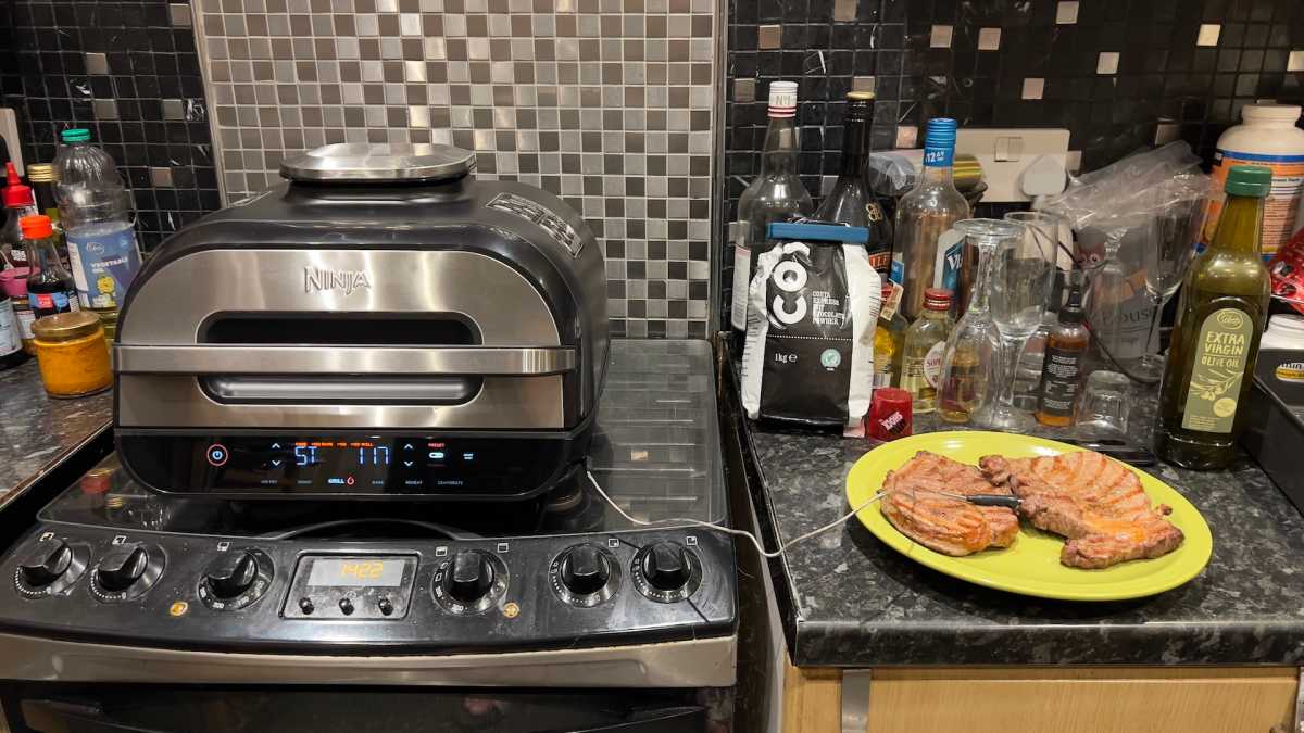 Leaving steak to rest next to Ninja Foodi MAX Health Grill & Air Fryer