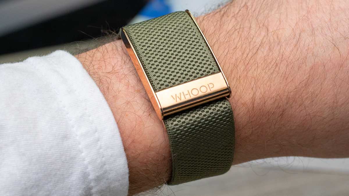 A Whoop 4.0 band on a left wrist