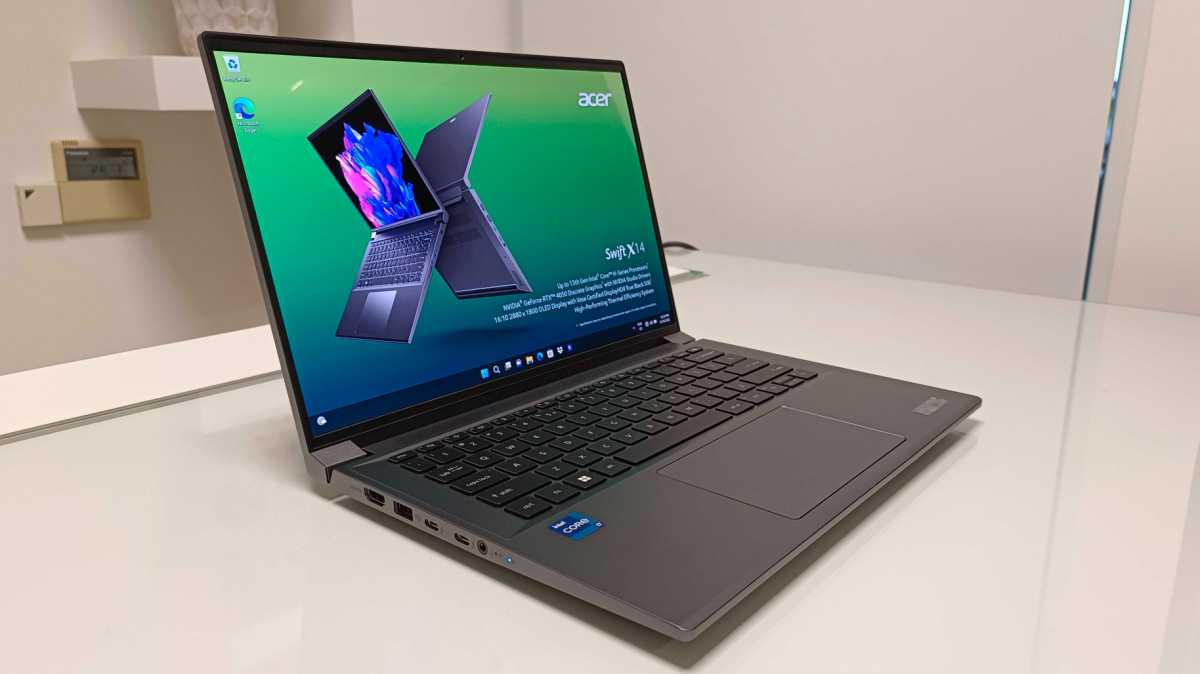 Picture of a grey Acer laptop on a desk