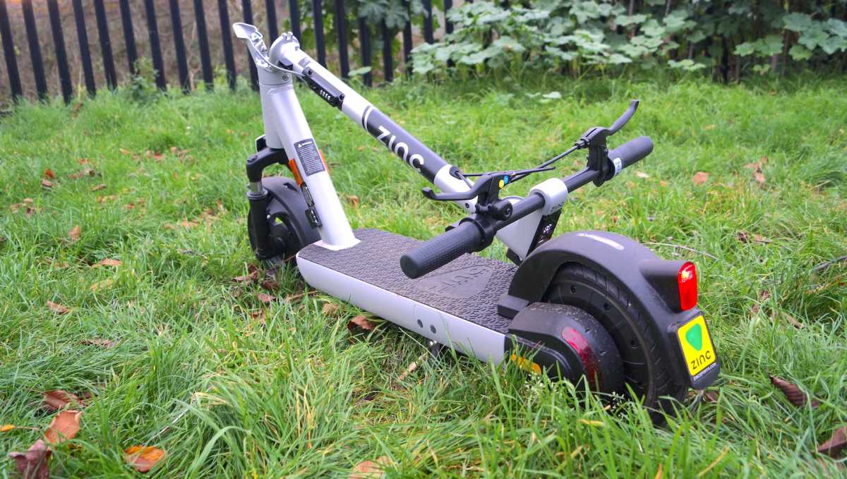 Zinc Velocity Plus electric scooter folded on the grass