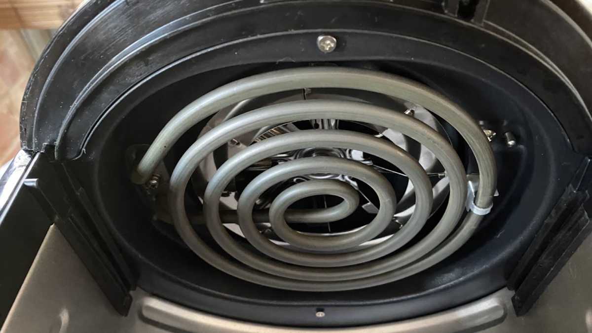 Coiled heating element inside an air fryer