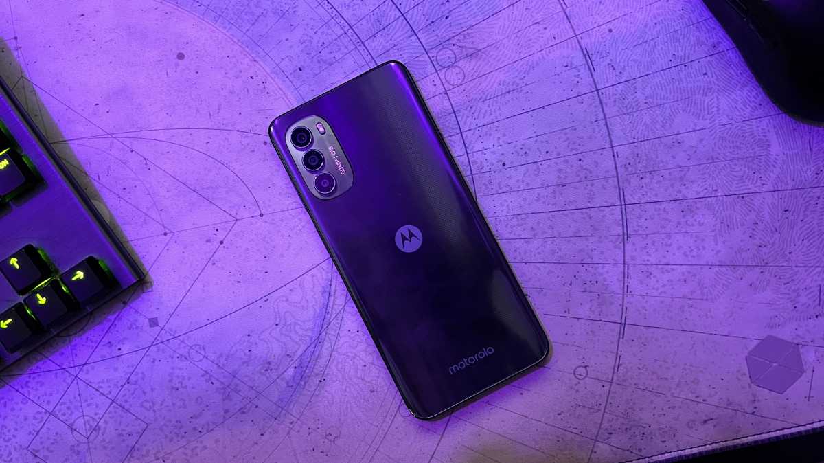 Motorola Moto G82 5G under a purple light