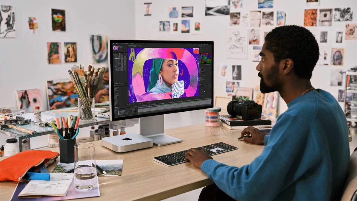 Apple Mac Mini 2023 with keyboard, mouse and monitor on desk