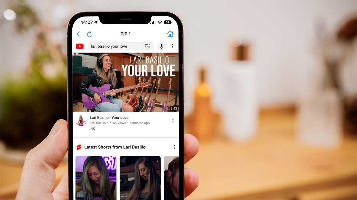 How to Play YouTube in the Background on an iPhone (2024) - Tech Advisor