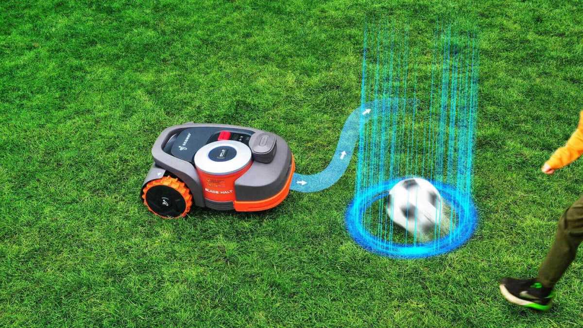 The Navimow steers around a soccer ball