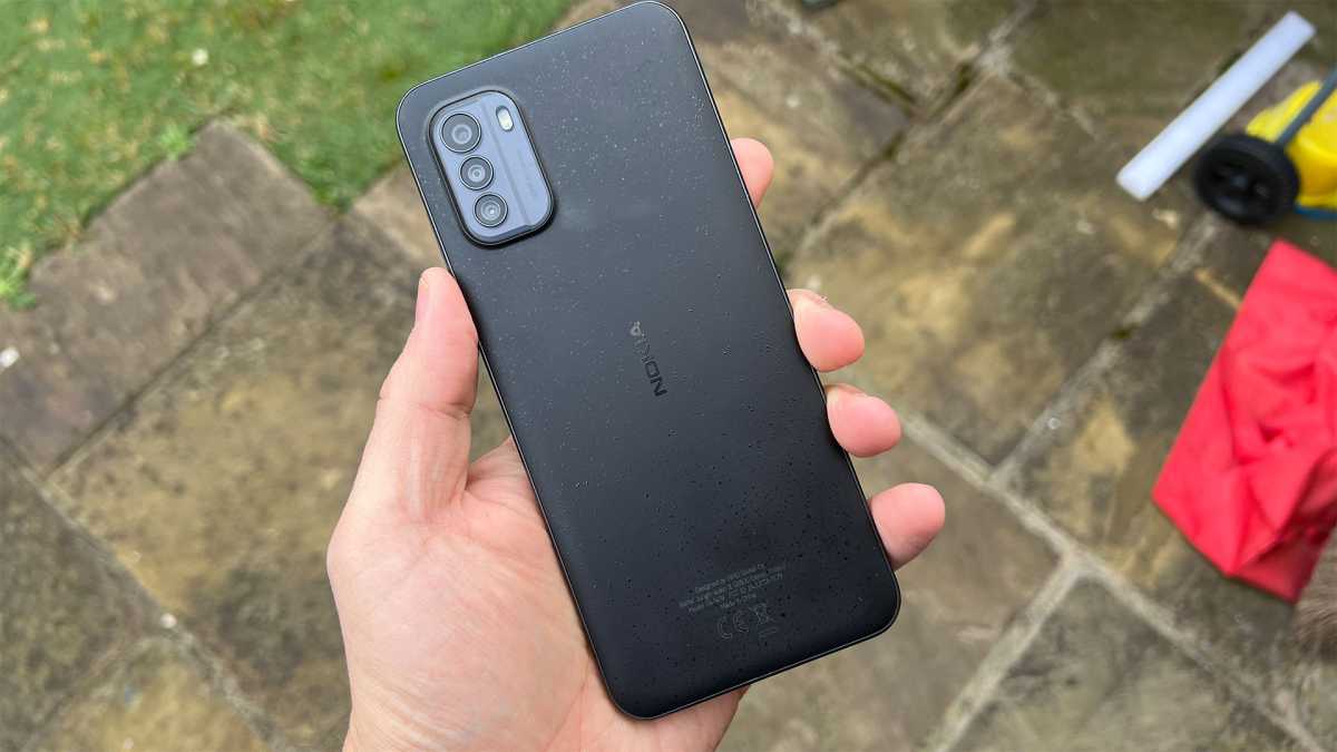 Nokia G60 in hand outdoors