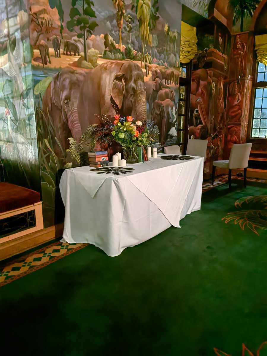 Bunch of flowers on a table in a room