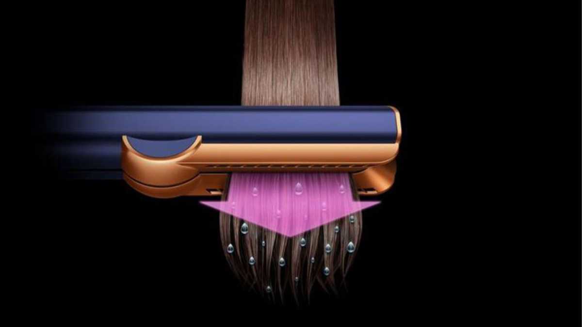 The Airstrait being passed through hair, straightening and drying