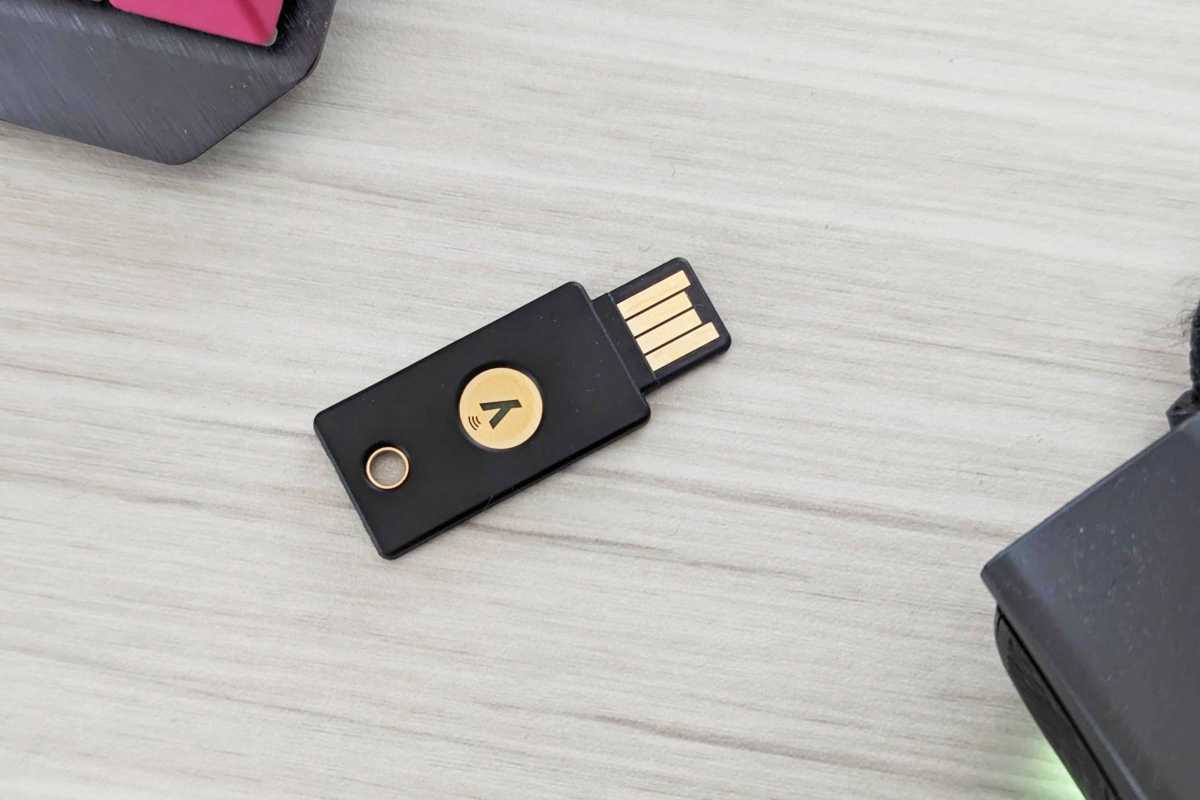 YubiKey 5 on a light gray tabletop